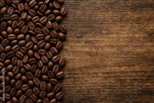 Vintage wooden surface with scattered coffee beans