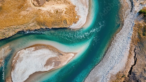Aerial view Montana river confluence sediment mixing patterns: natural abstract art for geology textbooks, wall decor