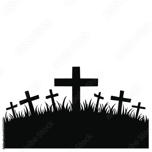 Silhouetted crosses in grassy cemetery scene