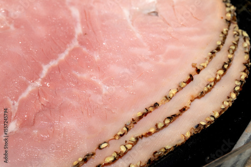 Close up of sliced pink pork ham meat for salad