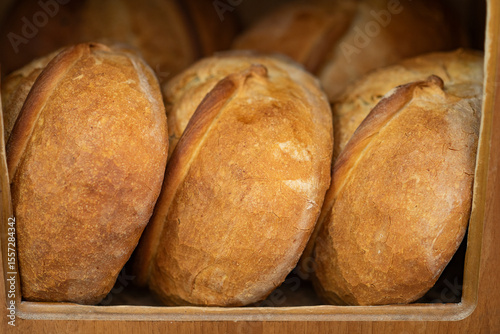 Freshly baked sourdough breads on shelves n a traditional bakery in Turkey