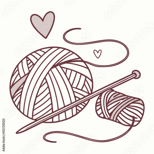 Yarn balls and knitting needles with hearts craft hobby