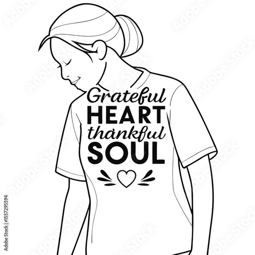 Woman wearing t shirt with grateful heart thankful soul quote