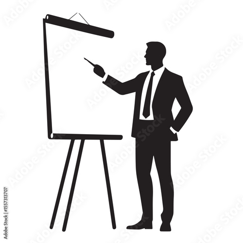 Silhouette of a businessman in a suit pointing at a flip chart during a presentation or meeting