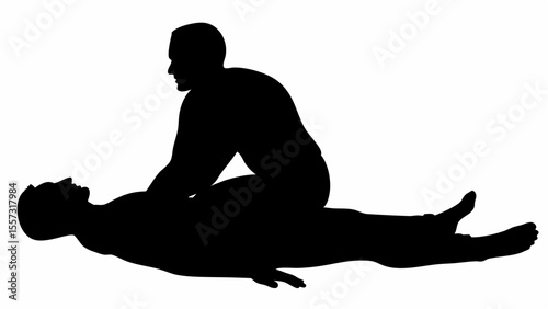 Silhouette of a man sitting on another man who is lying down giving a massage in black and white