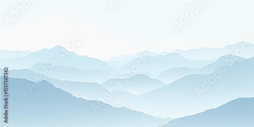 Misty mountain landscape with clouds at dawn