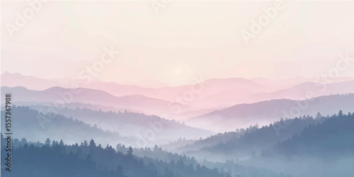Sunrise over misty mountain landscape with fog and glowing morning light in the hills