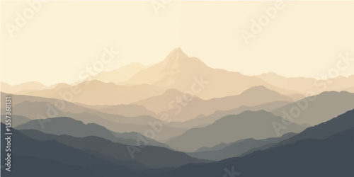 Misty mountain landscape with morning fog and soft light over forested hills and valleys