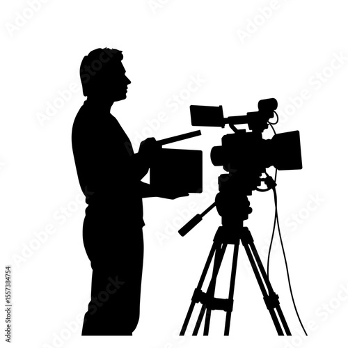 Silhouette of person with clapperboard and camera setup, filmmaking production start