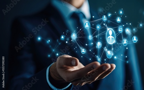 Businessman holds digital network of people