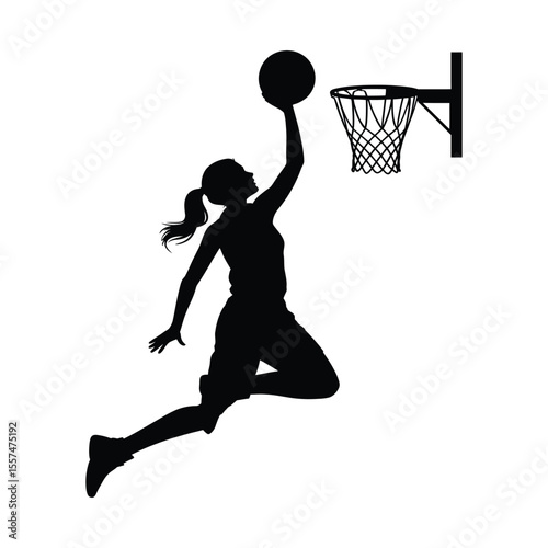Silhouette of a basketball player jumping to shoot the ball into the hoop