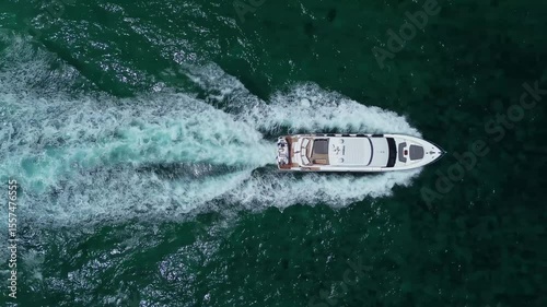 Wallpaper Mural Overhead aerial view of yacht cruising on the ocean in 4K Torontodigital.ca