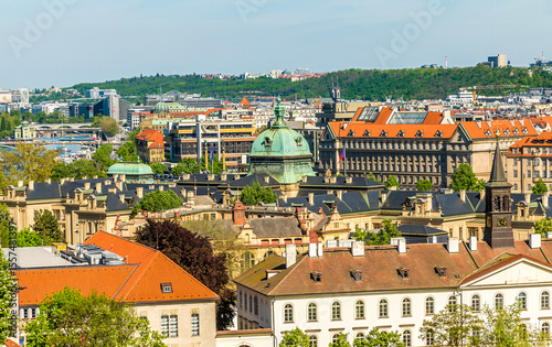 A view from the castle complex over the ornate, gothic buildings in Prague in springtime