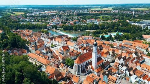 Landsberg am Lech, charming Bavarian town captured from drone. Historic old town, Lech River, Mariä Himmelfahrt Church, aquapark, small waterfall and colorful summer scenery