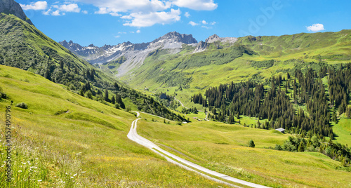 pictorial Gafiertal valley with hiking trail, prattigau alps, spring landscape switzerland