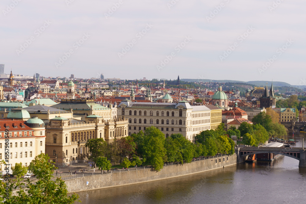 Fototapeta premium Panoramic view of Prague with Vltava River and historic bridges