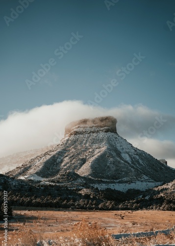 Snow-Covered Mesa with Cloud Cap at Sunrise