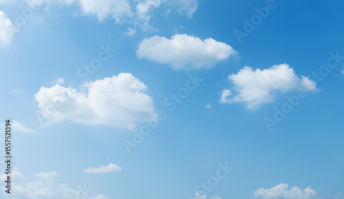 Fototapeta Naklejka Na Ścianę i Meble -  Background of blue sky with some white clouds