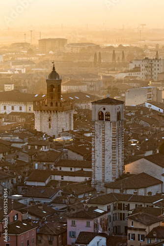 The Pallata Tower and the bell tower of the church of San Giovanni Evangelista. Brescia, Lombardy, Italy.
