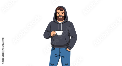 A man with a beard wearing a hoodie and jeans holding a mug of coffee or tea casually
