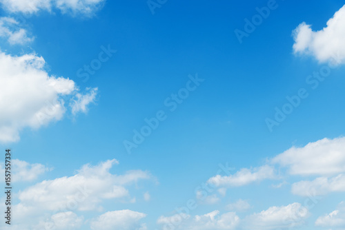 Background of blue sky with some white clouds