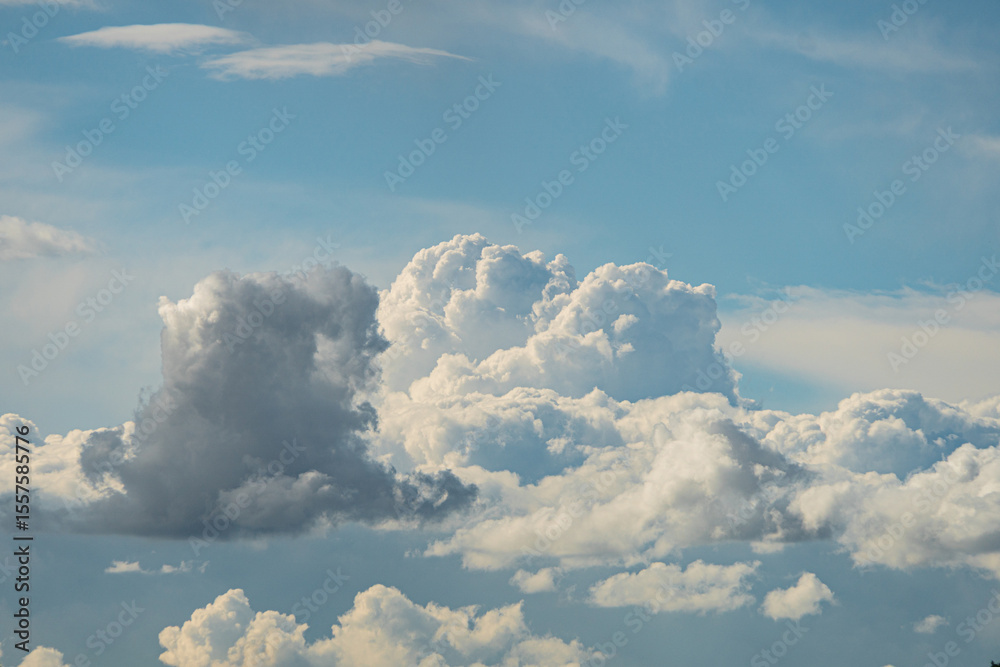 Ταπετσαρία Distant view of large, billowing cumulus clouds under a dramatic sky, dominated