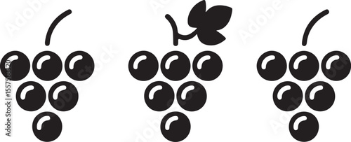 Three bunches of grapes with leaves isolated on white background