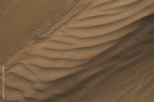 Texture of sand and earth, sand dunes and mountains
