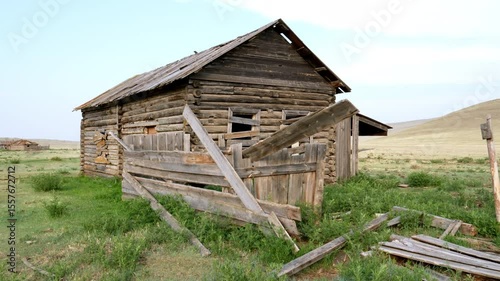 Summer. Day. Old abandoned wooden house