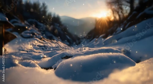 Snowfall in a Winter Valley at Sunset with Golden Light and Sparkle Details in Scenic Wilderness