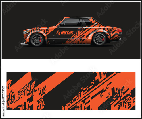 Car Wrap Design with Orange and Black Geometric Pattern on a Classic Vehicle