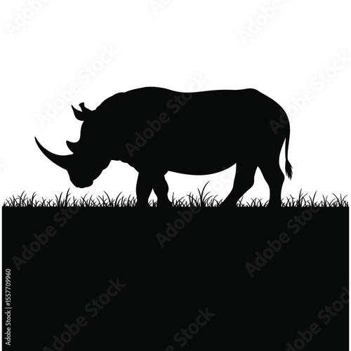 Rhino silhouette on grassland horizon for wildlife and nature-themed vector design