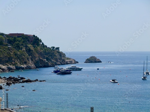 Fototapeta Naklejka Na Ścianę i Meble -  View of the Ionian Sea coast at Taormina town, Sicily, Mediterranean Sea coast. Italy