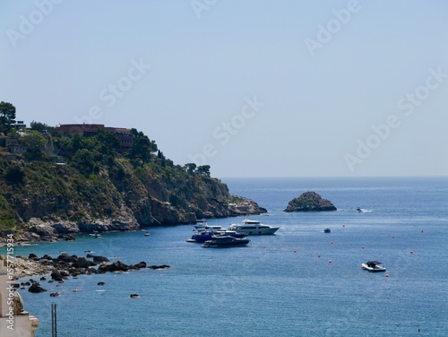 Fototapeta Naklejka Na Ścianę i Meble -  View of the Ionian Sea coast at Taormina town, Sicily, Mediterranean Sea coast. Italy