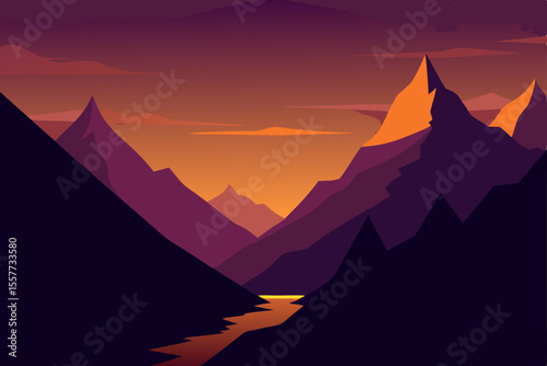 deep valley with towering dark peaks at golden