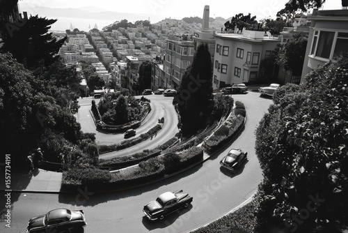 Cars navigate the winding curves of Lombard Street in San Francisco on a sunny day, Aerial view of cars driving on Lombard Street
