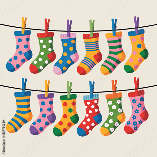 Colorful patterned socks hanging on a clothesline with clothespins