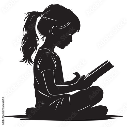 Silhouette of a young girl with a ponytail reading a book