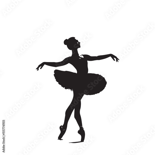 Elegant silhouette of a ballerina performing a graceful pose on pointe