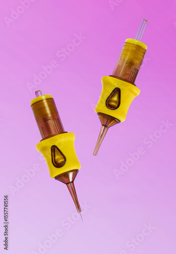 Two syringes with bright yellow handles are positioned on a reflective purple surface. The design highlights both functionality and aesthetic appeal, creating an intriguing visual contrast.