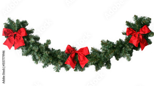 A festive christmas garland with three large red satin bows is isolated on transparent background