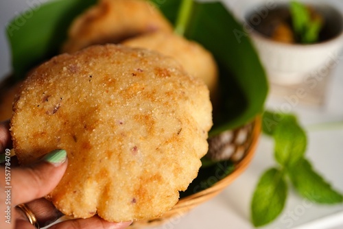 Kerala breakfast Ney pathal or pathiri  served with chicken curry- malabar Iftar foods