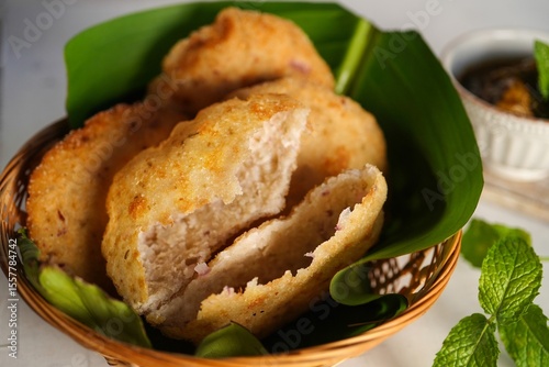 Kerala breakfast Ney pathal or pathiri  served with chicken curry- malabar Iftar foods