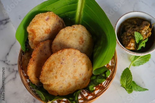Kerala breakfast Ney pathal or pathiri  served with chicken curry- malabar Iftar foods