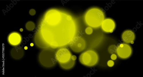 Yellow glowing bokeh with layered circle particles and blur effect on black backdrop. Creates a dramatic, energetic visual for digital compositions.