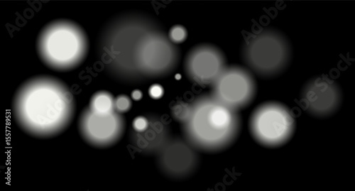 White blurred bokeh circles on black background with soft glow, imitating distant lights or defocused highlights in low-light environment.