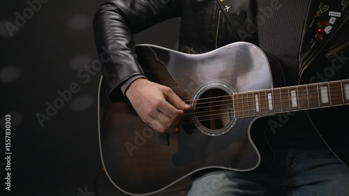 The guitarist starts playing