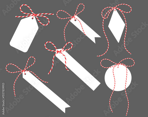 White flat Gift Tag with Ribbon Bow Isolated on grey Background. Blank Christmas New Year label for present tied up with cotton red rope bakers twine. Vector Labels for Holiday and Packaging Design