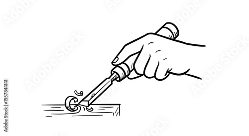 Hand holding screwdriver while turning screw in wood surface  