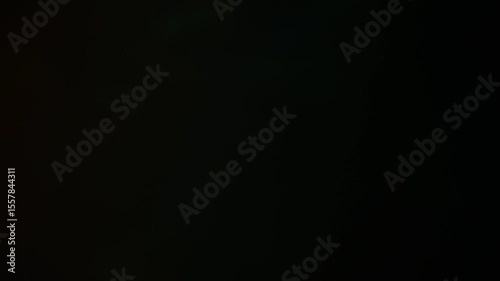 Light organic leaks effect background animation stock footage. Lens light leaks flashing around making an elegant abstract background animation. Classic Light Leak in 4k